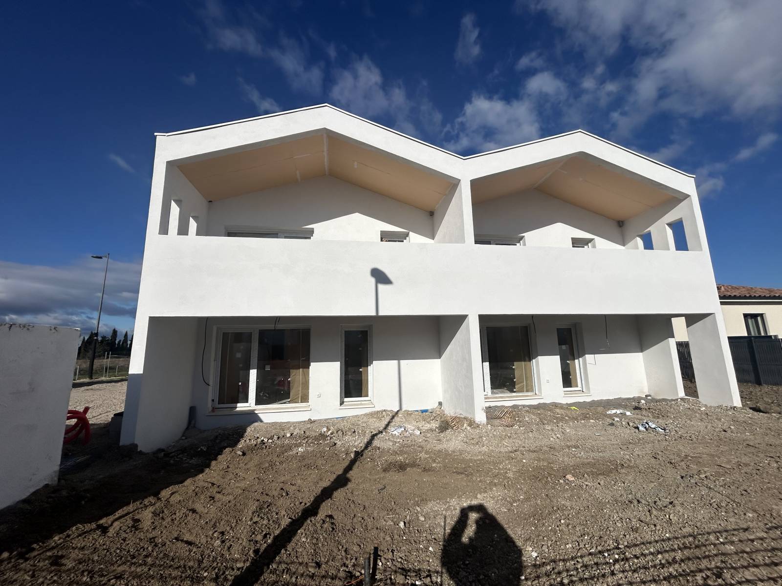 Réalisation d’un enduit monocouche sur copropriété neuve à Florensac